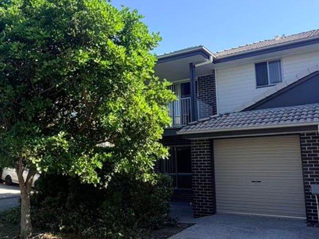 Spacious 3 Bedroom Townhouse in Quiet Complex with Pool