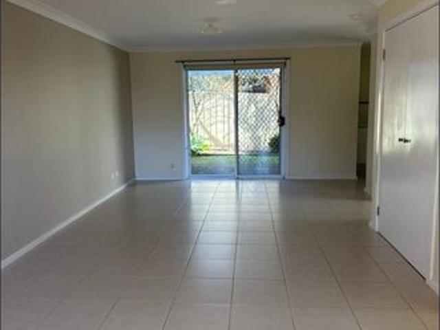 Spacious 3 Bedroom Townhouse with Private Backyard & Garage