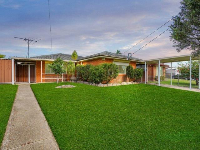 Spacious Three Bedroom Brick Family Home with Abundant Storage & Parking!