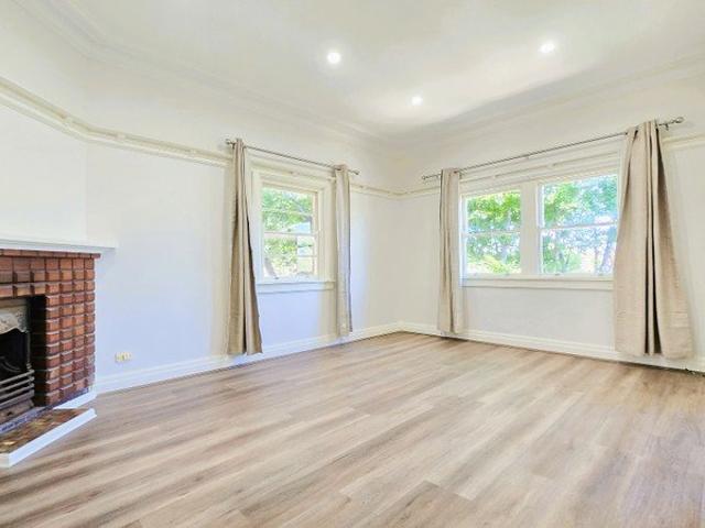 SPACIOUS THREE BEDROOM DUPLEX WITH OCEAN VIEWS AND PRIVATE BACKYARD