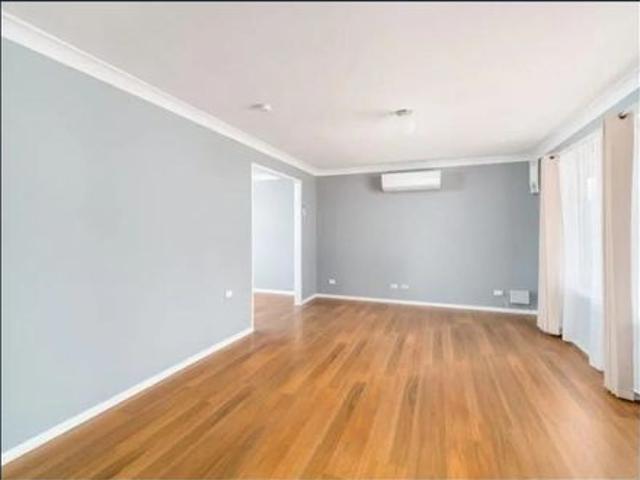 Spacious Three Bedroom Home with Triple Bay Garage!