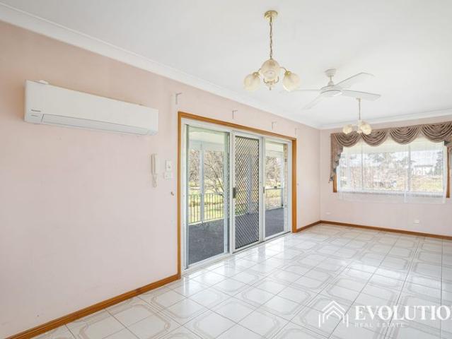 Spacious Three Bedroom Home with Triple Garage
