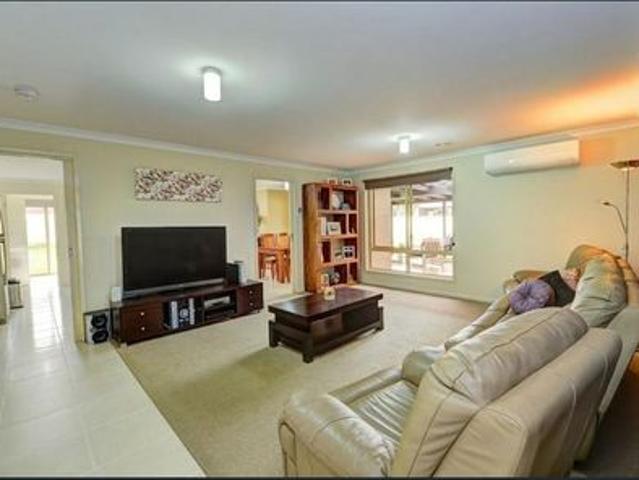 SPACIOUS THREE BEDROOM HOME WITH DECK FOR ENTERTAINING
