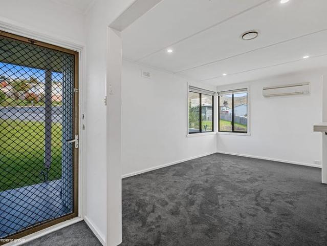 Spacious Three Bedroom Home with Enclosed Yard
