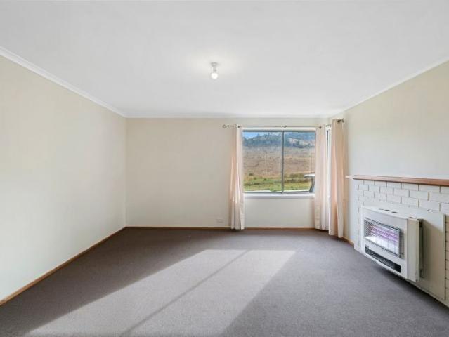 Spacious Three Bedroom Home with Generous Fenced Yard