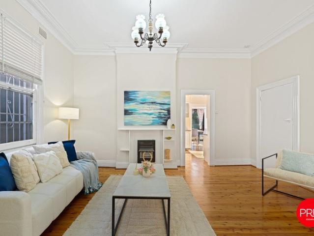 Spacious Three Bedroom Home with High Ceilings & Generous Backyard