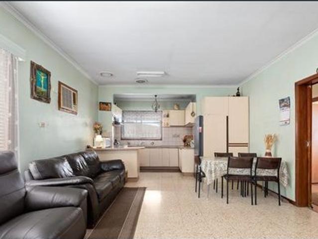 Spacious Three Bedroom Home with Huge Backyard