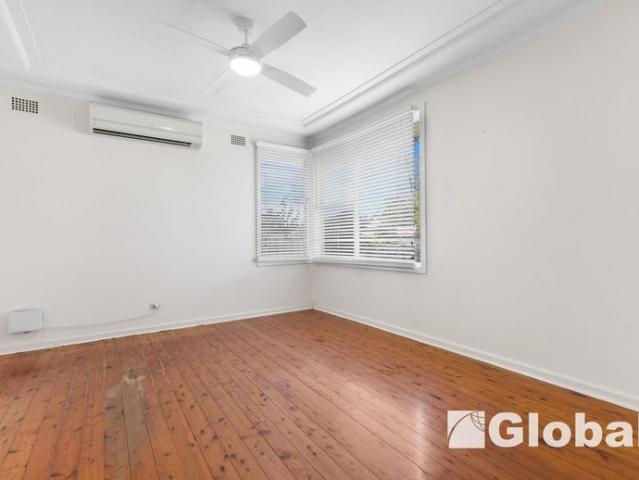 Spacious Three Bedroom Home with Huge Backyard