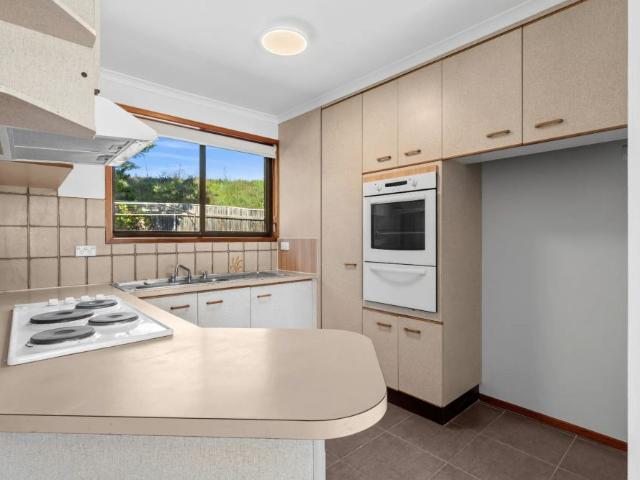 Spacious Three Bedroom Home with Large Yard in Convenient Location