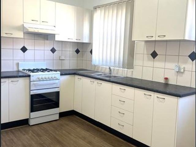 Spacious Three Bedroom Home with Large Backyard
