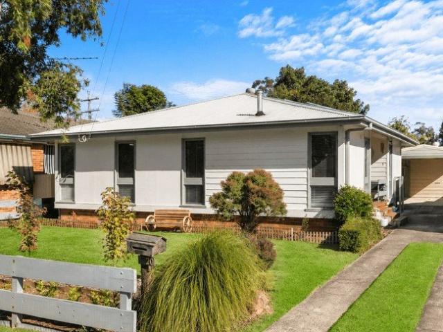 Spacious Three Bedroom Home with Large Shed & Convenient Access