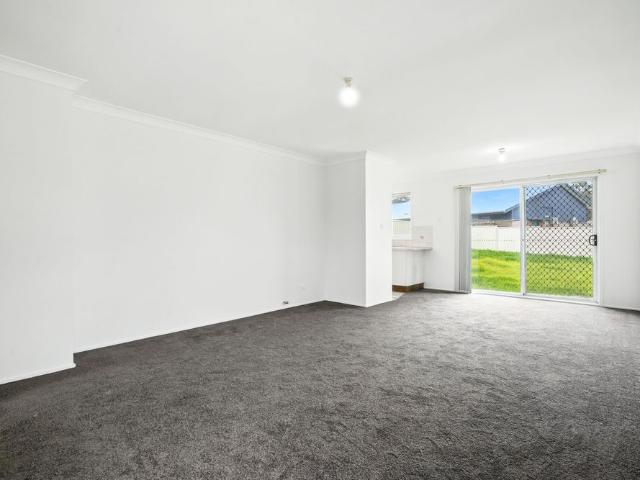Spacious Three Bedroom Home With Lock Up Garage !