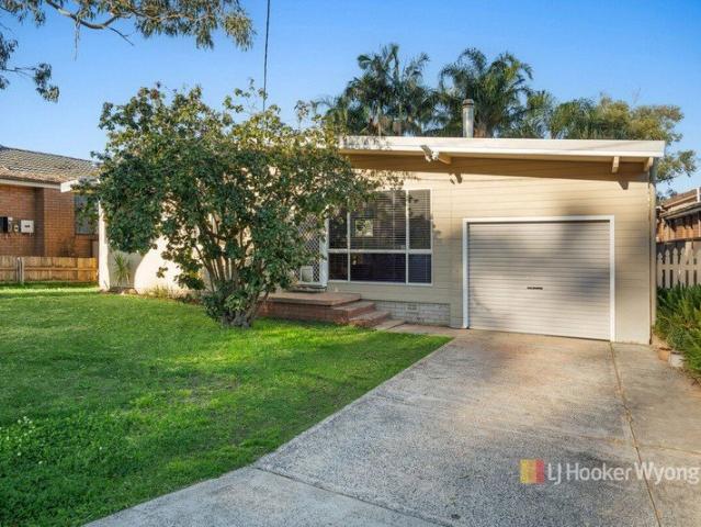 Spacious Three Bedroom Home with Sunroom, Great Yard & Granny Flat Potential