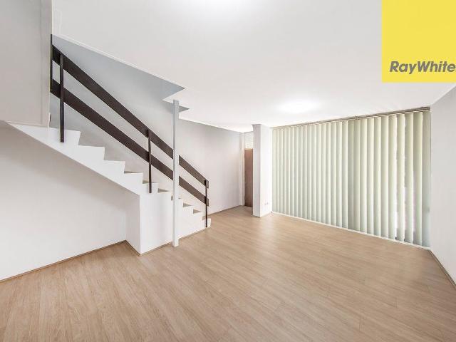 Spacious Three Bedroom Townhouse with Courtyards & Lock Up Garage