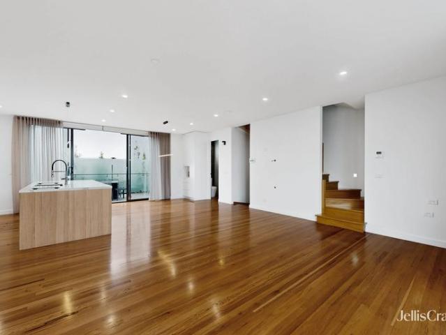 Spacious Three Bedroom Townhouse with Double Garage and Multiple Balconies