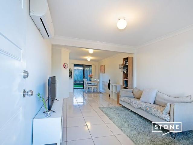 Spacious Three Bedroom Townhouse with Private Courtyard & Complex Pool!