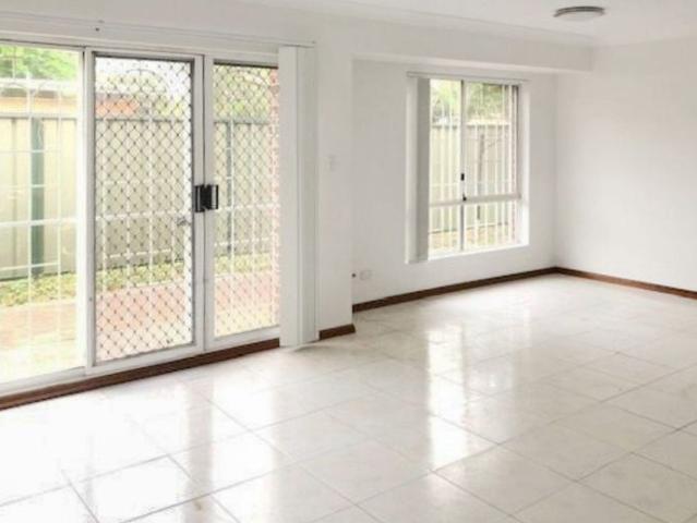 Spacious Three Bedroom Townhouse Adjoining Woodville Park!