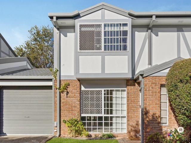Spacious Three Bedroom Townhouse in a Gated Complex