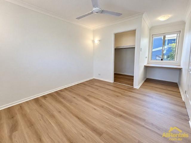 Spacious Three Bedroom Townhouse Moments from Parkland