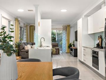 Spacious Three Level Townhouse in Prime Setting
