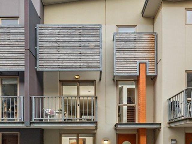 SPACIOUS THREE LEVEL TOWNHOUSE WITH OUTDOOR ENTERTAINING AREA