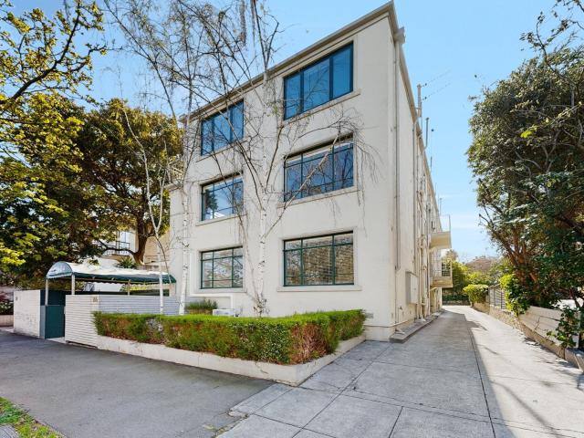 Spacious Top Floor Apartment with Brand New Updates Throughout