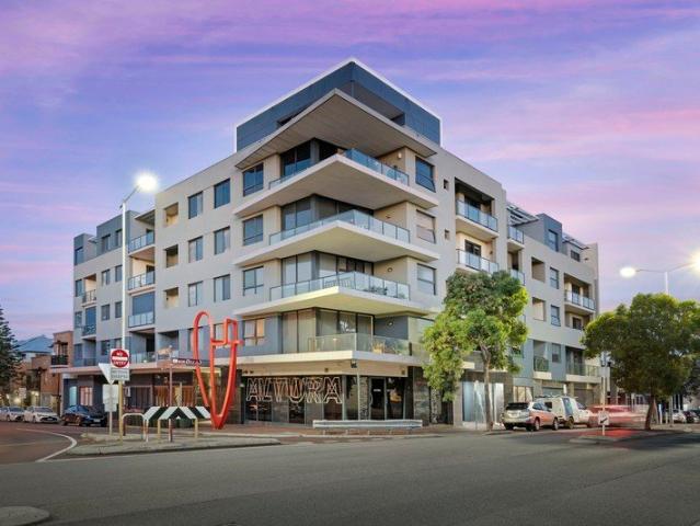 SPACIOUS TOP FLOOR LIVING WITH STUNNING VIEWS!