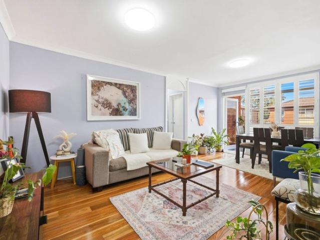 Spacious Top Floor Two Bedroom Unit with Parking