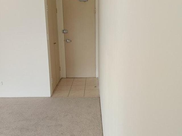 Spacious Top floor unit lots of natural light. 2 bed, 2 bath and a 2 car garage