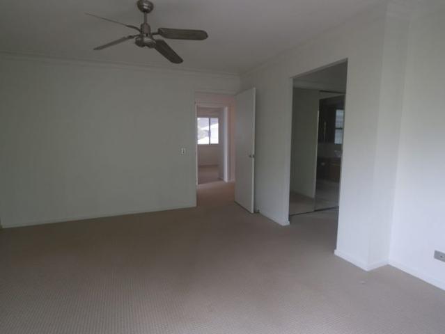 SPACIOUS TOWNHOUSE IN GATED COMPLEX