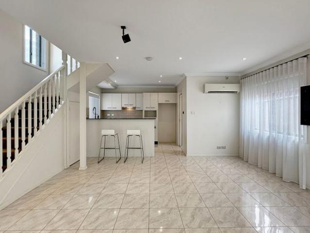 Spacious Townhouse Living in an Exclusive Gated Complex