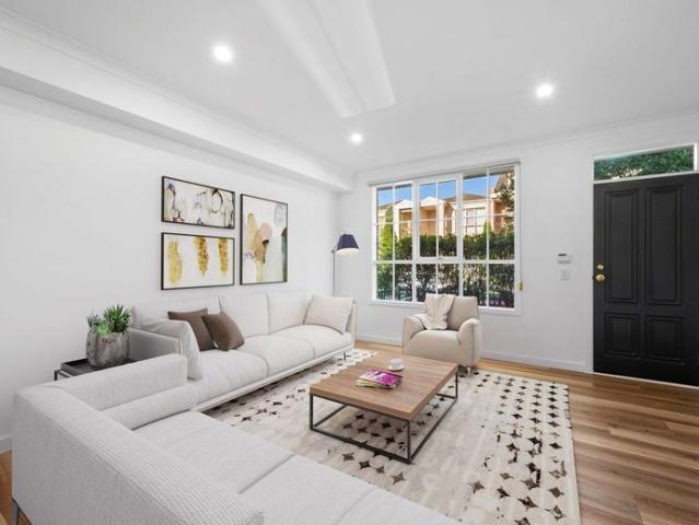 Spacious Townhouse Living in Popular Brunswick!