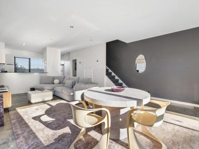 Spacious Townhouse Living with Expansive Wraparound Balcony