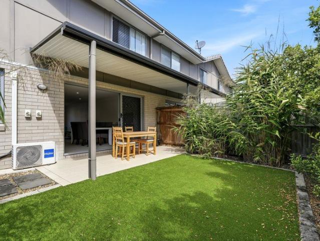 Spacious Townhouse Living With Private Courtyard & Exceptional Convenience