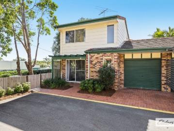 Spacious Townhouse Living with Private Courtyard & Wraparound Yard!