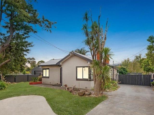 Spacious Townhouse with 4 Bedrooms, Large Lot, and Development Potential!