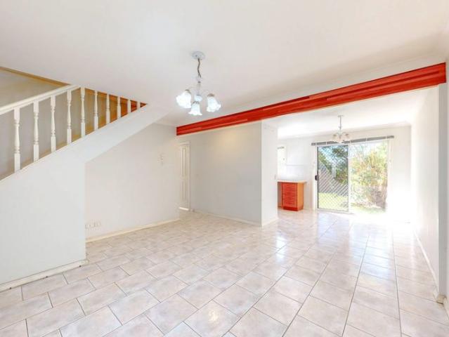 Spacious Townhouse with Large Backyard in Sought After Wishart!