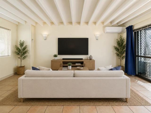 Spacious Townhouse with Private Courtyard in Prime Indooroopilly Location