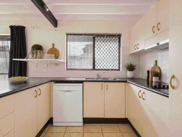 Spacious Townhouse with Private Courtyard in Prime Indooroopilly Location