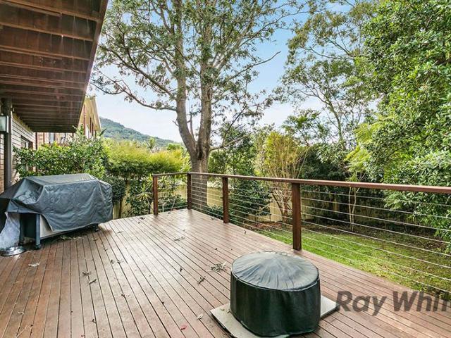 Spacious Tri Level Family Home with Leafy Outlooks Peaceful Living in Figtree