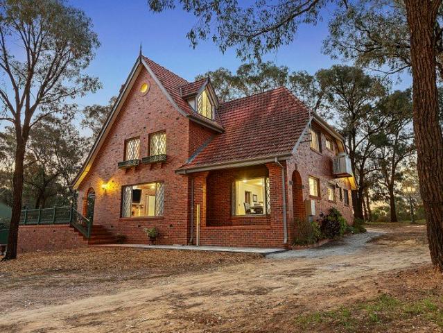 Spacious tri level living, unique double brick design