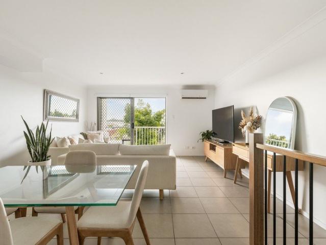 Spacious Tri Level Living with a Desirable North Facing Aspect and Shared In Ground Pool