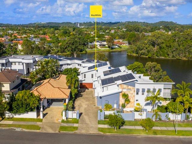 Rare waterfront lifestyle opportunity in tightly held Varisty Lakes enclave