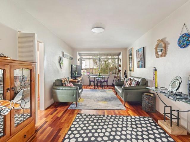 Spacious Two Bedroom Apartment with Oversized Private Courtyard & Lock Up Garage