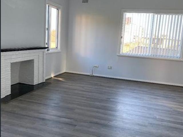 Spacious Two Bedroom Home with Separate Living Areas and a Pet Friendly Yard