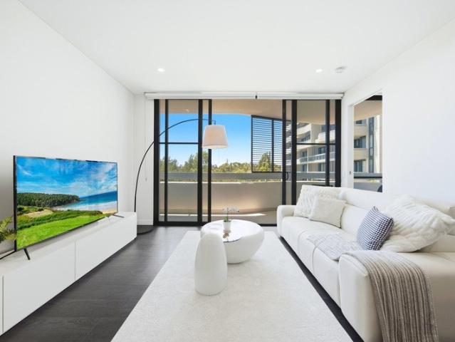 SPACIOUS TWO BEDROOM PLUS STUDY | NORTH ASPECT | DISTRICT VIEWS | Timber Floor| Rare 27sqm car spacs