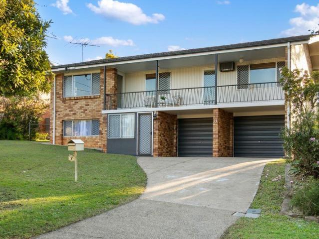 Spacious Two Level Home with Forest Outlook and Endless Potential