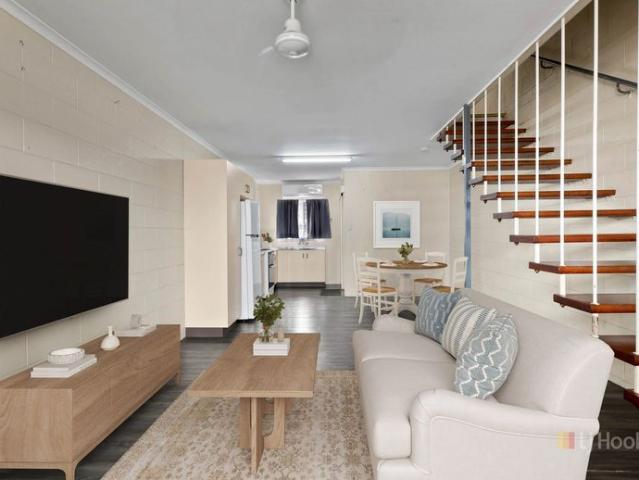 Spacious Two Level Unit Opposite Caneland Central