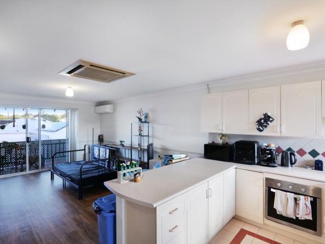 SPACIOUS UNIT IN QUIET COMPLEX WITH POOL
