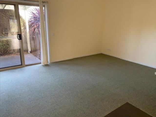 SPACIOUS UNIT WITH AIR CONDITIONING IN PERFECT LOCATION